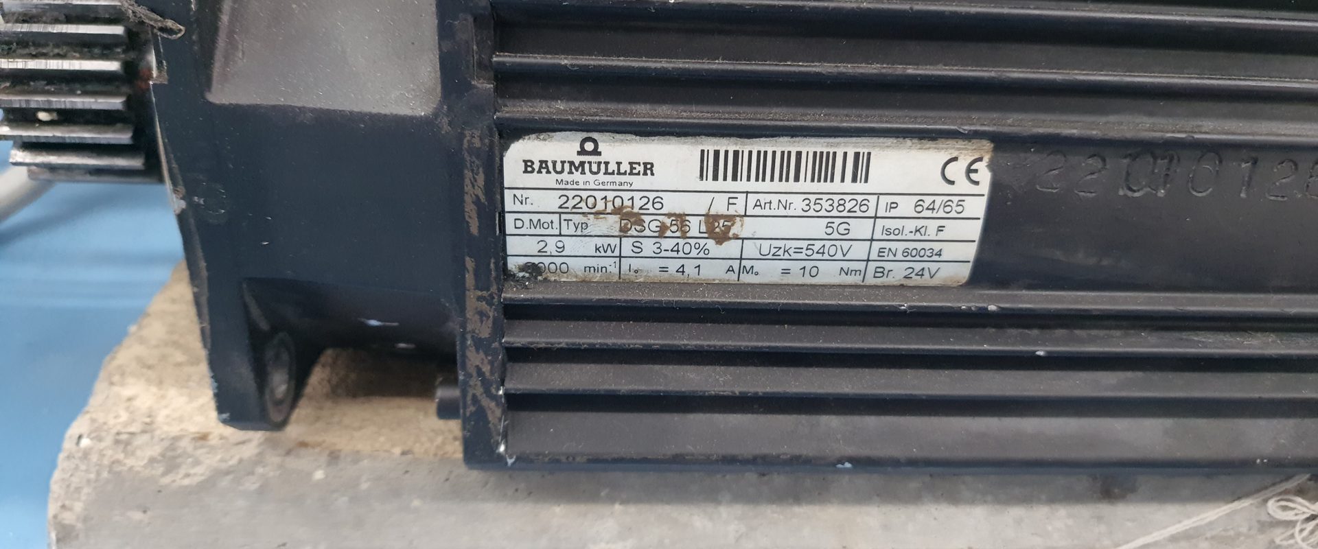 BaumÃ¼ller servo motor nameplate on workshop floor